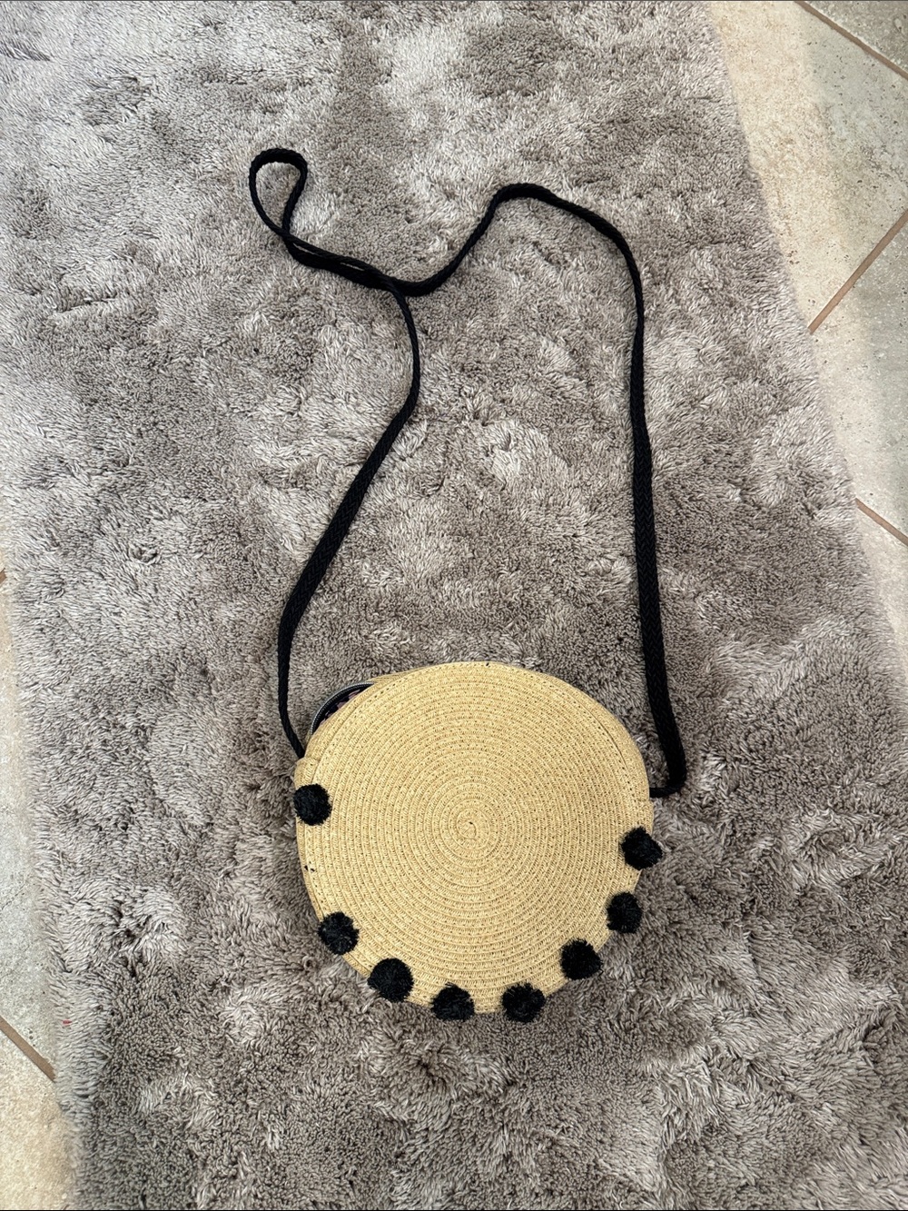 Stella & Dot Beige Round Straw Crossbody with Black Pom Accents